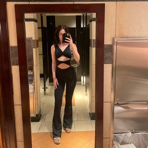 Black jumpsuit/white fox